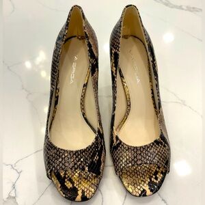Via Spiga size 7 tan and black snake skin heels gently used